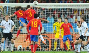 Carles Puyol heads home the winning goal for Spain against Germany at the 2010 World Cup